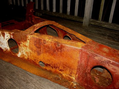 Canada Coupe chassis location hole.JPG and 